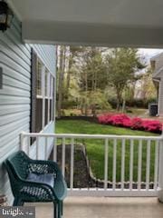 balcony featuring a porch