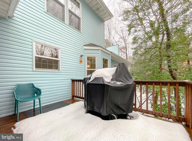 wooden terrace with grilling area