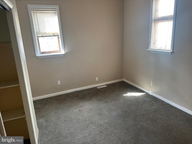 spare room with carpet