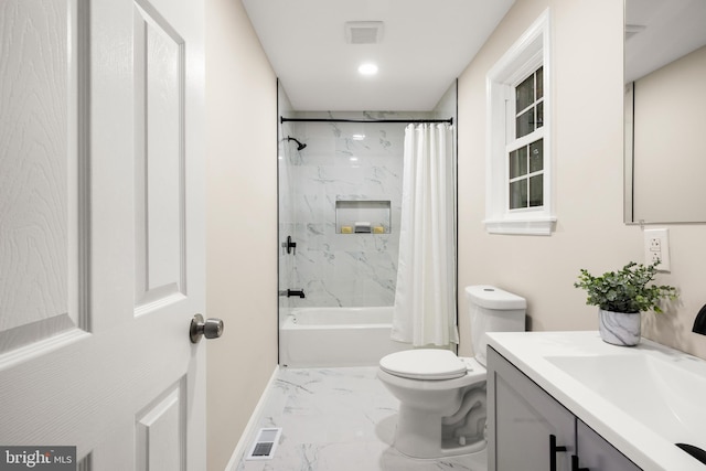 bathroom featuring visible vents, toilet, marble finish floor, shower / bath combo with shower curtain, and vanity