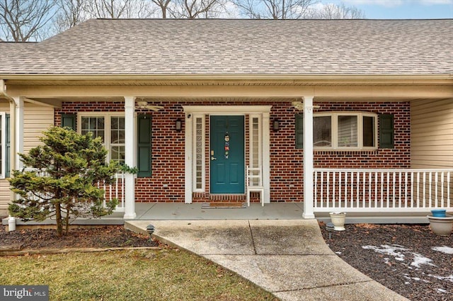 property entrance with covered porch