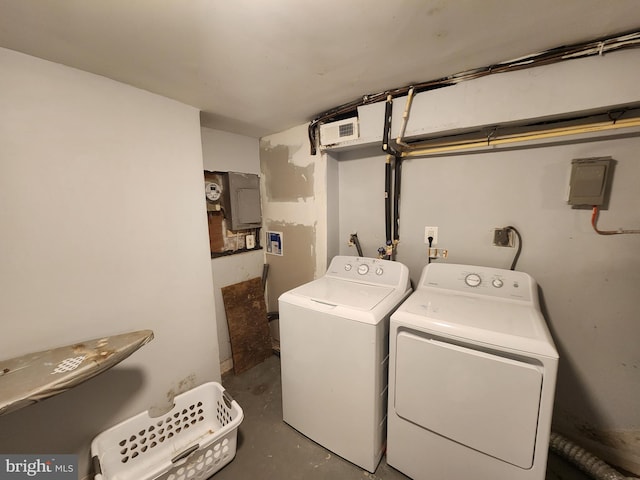 clothes washing area featuring washing machine and dryer