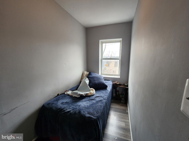 bedroom featuring hardwood / wood-style floors