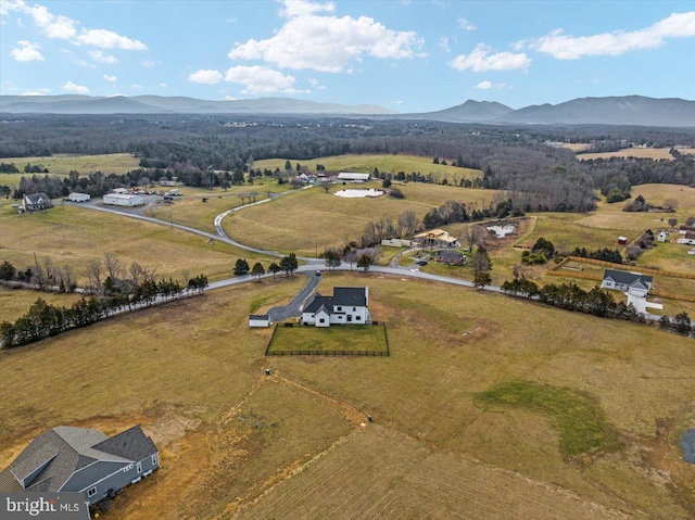 bird's eye view featuring a mountain view and a rural view