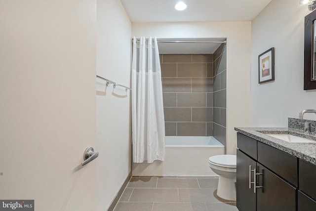 full bathroom with vanity, tile patterned flooring, shower / bath combination with curtain, and toilet