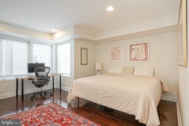 bedroom featuring dark hardwood / wood-style floors