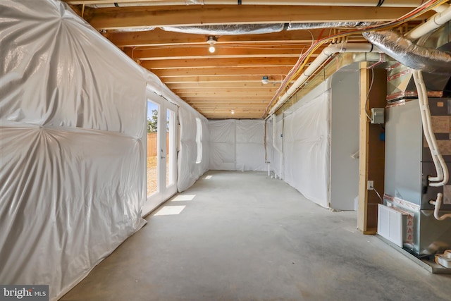 basement featuring heating unit