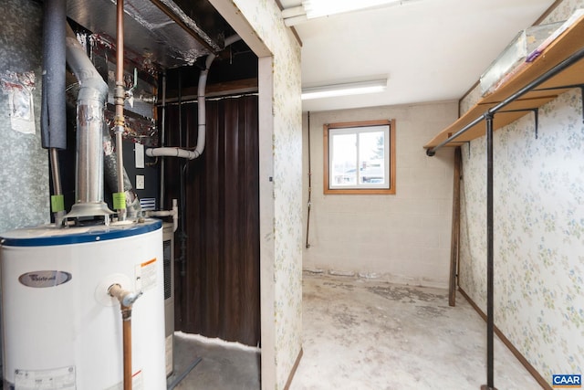 utility room with gas water heater