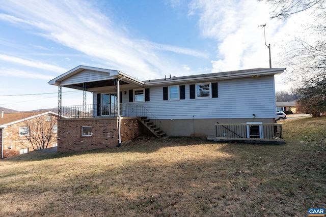 back of house with central AC and a yard