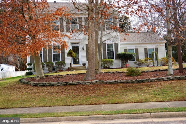 view of front facade with a front yard