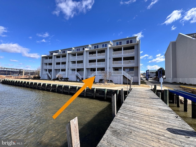 view of dock with a water view