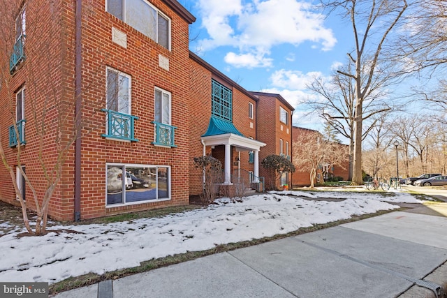 view of snow covered building