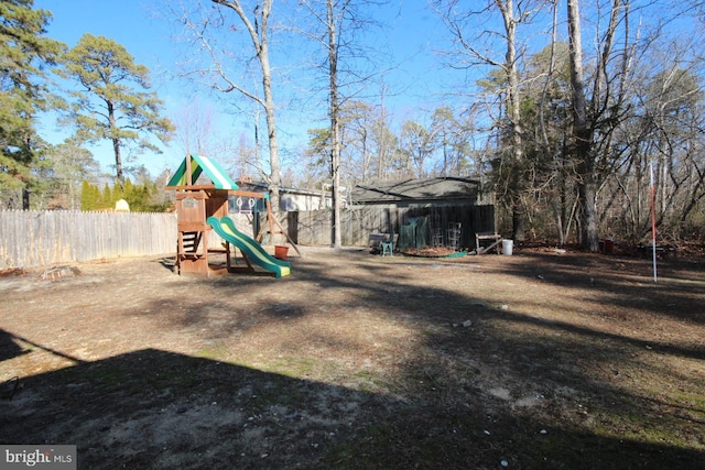 view of yard with a playground