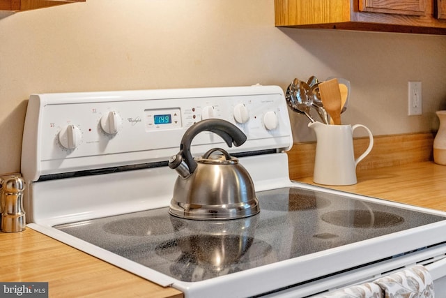 room details with white range with electric cooktop