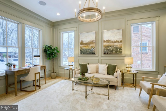 sunroom / solarium with a chandelier