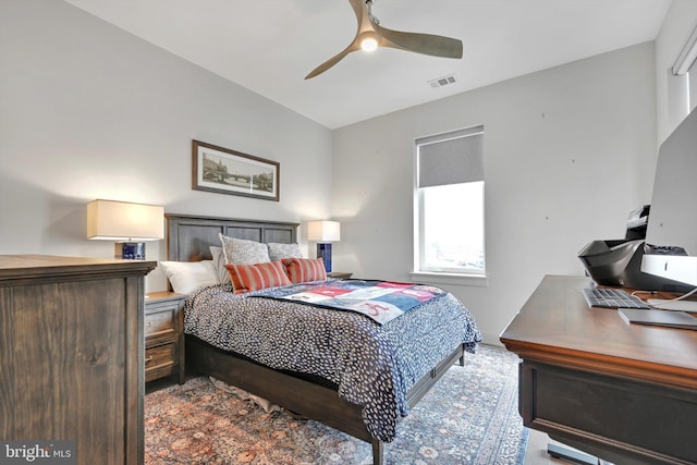 bedroom with a ceiling fan and visible vents