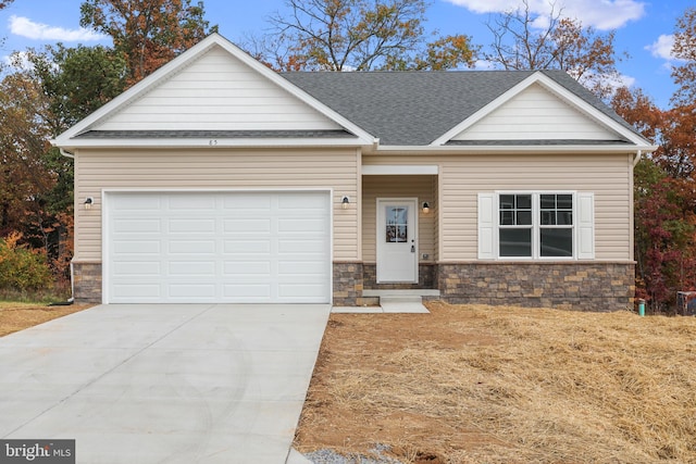 view of front of home with a garage