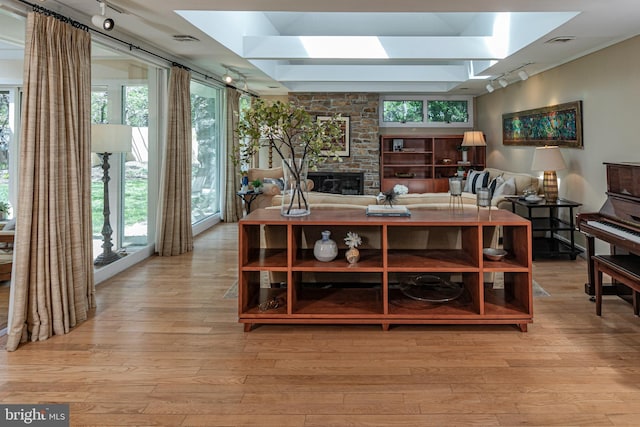 74 Wilson Rd, Princeton, NJ 08540 - interior space featuring visible vents, rail lighting, a skylight, and a fireplace