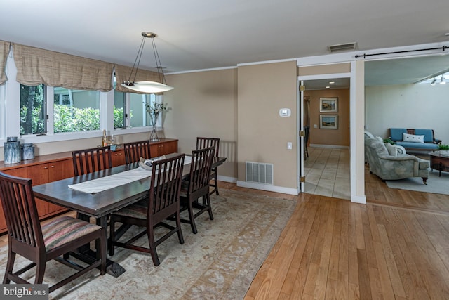 74 Wilson Rd, Princeton, NJ 08540 - dining room featuring baseboards, light wood-style flooring, and visible vents