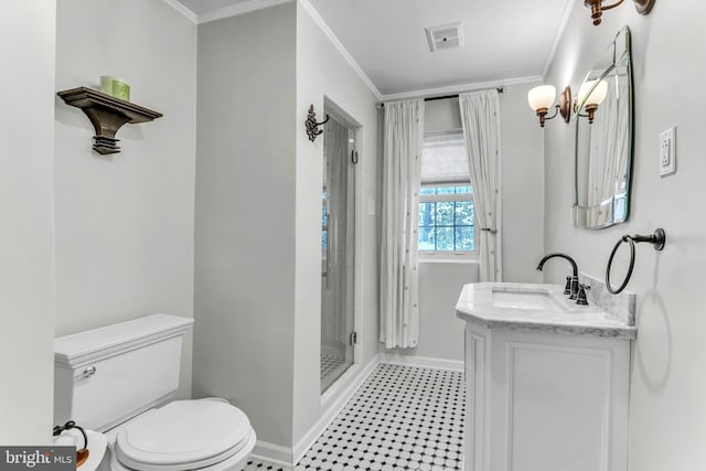 bathroom with ornamental molding, an enclosed shower, and vanity