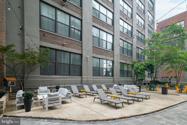 view of community with a patio