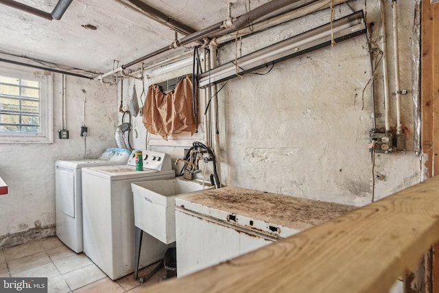 washroom with washer and dryer