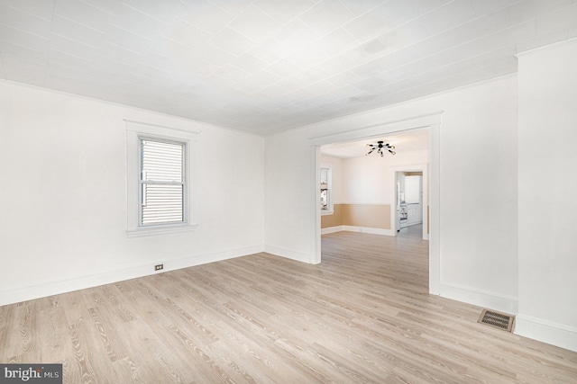 unfurnished room featuring light wood-type flooring