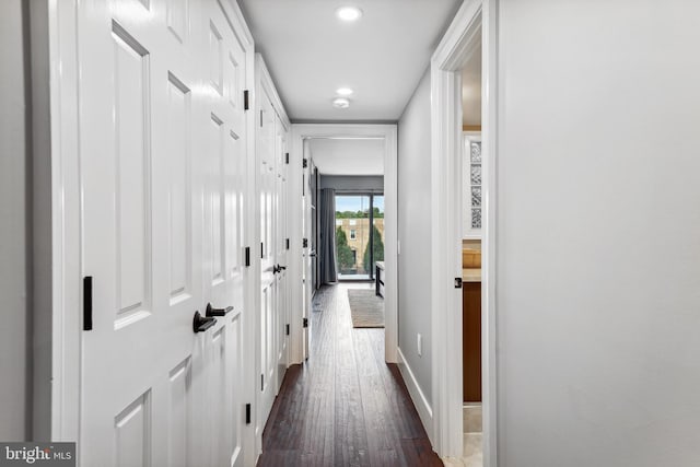 hallway featuring dark hardwood / wood-style floors