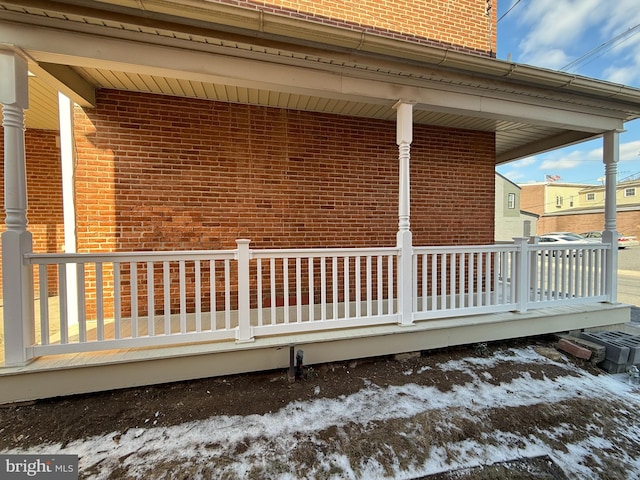 view of property exterior featuring a wooden deck