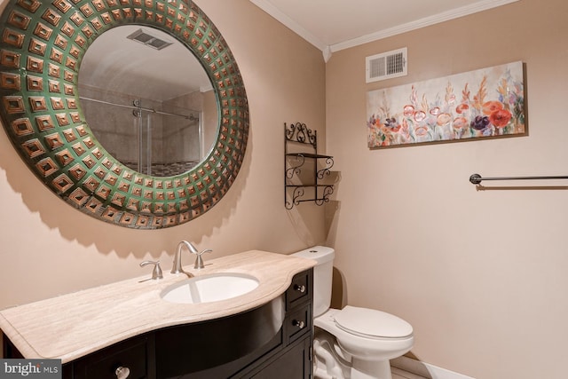 bathroom featuring vanity, ornamental molding, toilet, and walk in shower