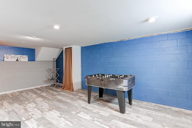 game room featuring wood-type flooring