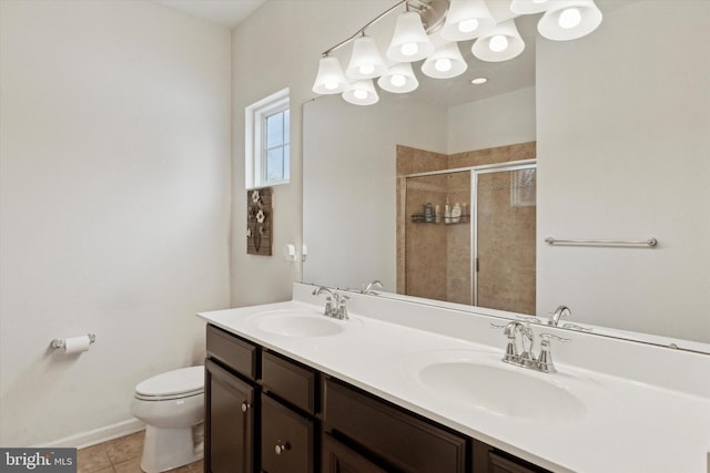 bathroom with vanity, an enclosed shower, tile patterned floors, and toilet