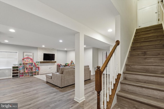 living room with light hardwood / wood-style floors