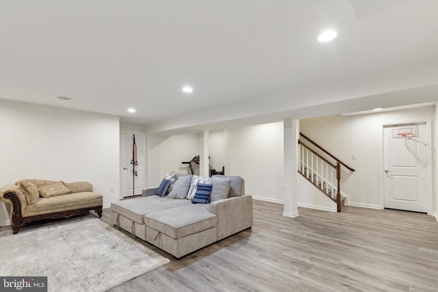 living room with light hardwood / wood-style flooring