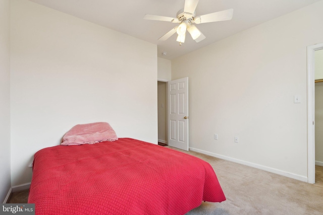 bedroom featuring carpet flooring, ceiling fan, and baseboards