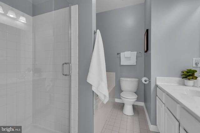 bathroom with vanity, an enclosed shower, tile patterned floors, and toilet