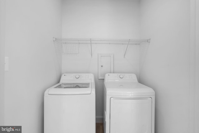 washroom with laundry area and washing machine and clothes dryer