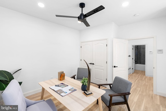 home office with a ceiling fan, light wood-type flooring, baseboards, and recessed lighting