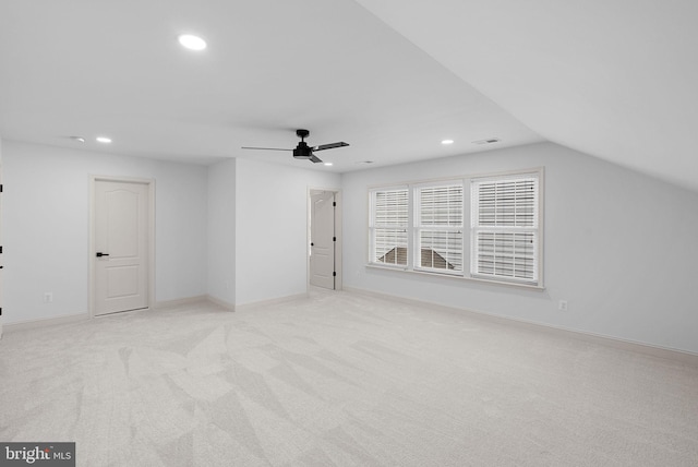 additional living space with light carpet, ceiling fan, baseboards, and recessed lighting