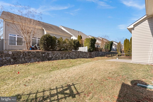 view of yard with a patio area and fence