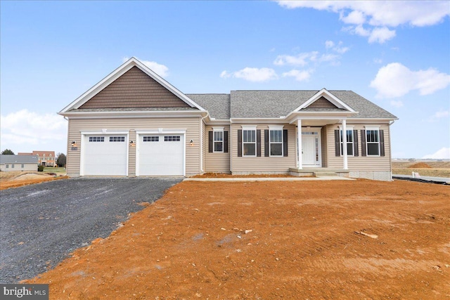 view of front of home featuring a garage