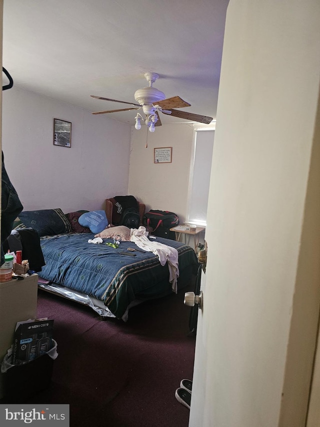 bedroom featuring carpet floors and ceiling fan