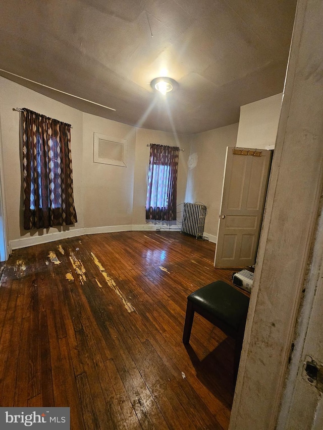 interior space with dark hardwood / wood-style floors