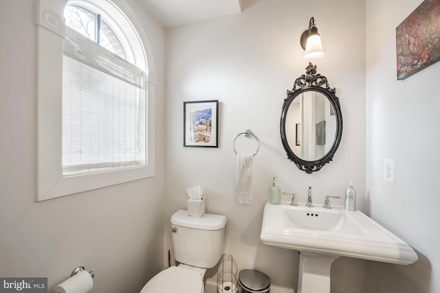 bathroom with toilet and sink