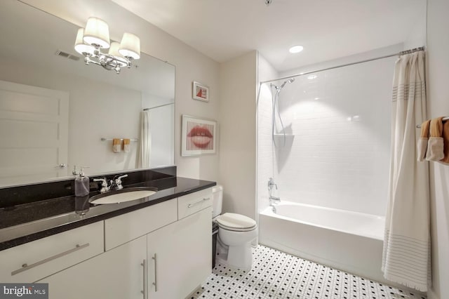 full bathroom with vanity, shower / bath combination with curtain, and toilet