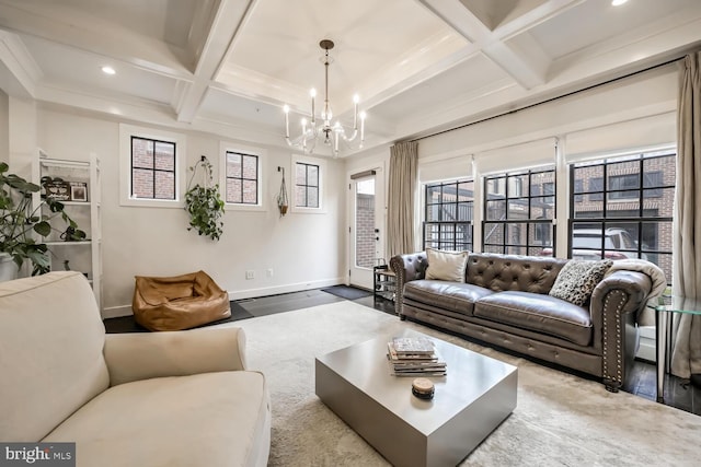 living room featuring beamed ceiling, coffered ceiling, and a notable chandelier