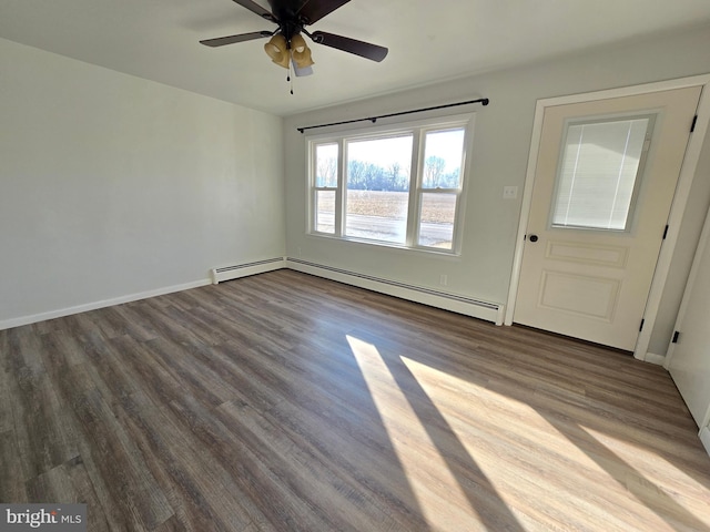 unfurnished room with hardwood / wood-style flooring, a baseboard radiator, and ceiling fan