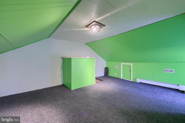 bonus room with lofted ceiling, carpet, and a baseboard heating unit