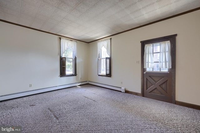 entryway with crown molding and carpet