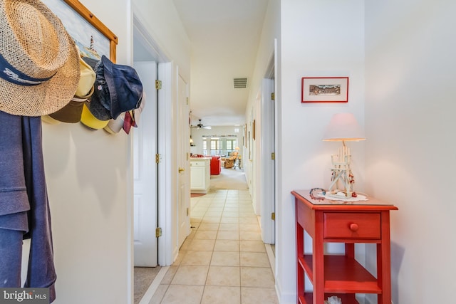 hallway with light tile patterned floors